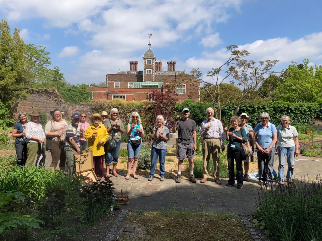 CABAHS volunteers celebrating National Volunteers Week 2021 in the Old Pond Garden, Charlton House