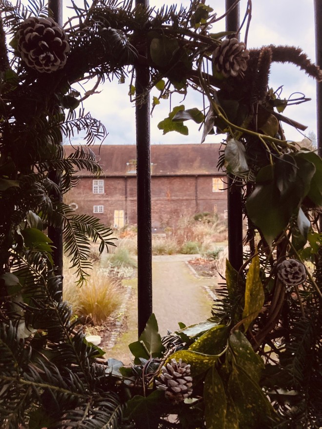 Christmas wreath on the gate to the Charlton House Old Pond Garden, December 2021