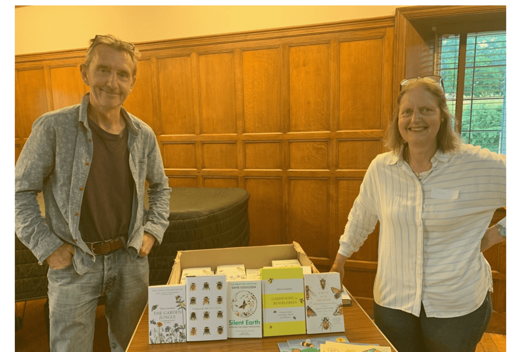 Dave Goulson with our Chair, Stella and the range of his books for sale at the meeting