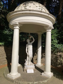 Bacchus, God of Wine, sheltering beneath the temple