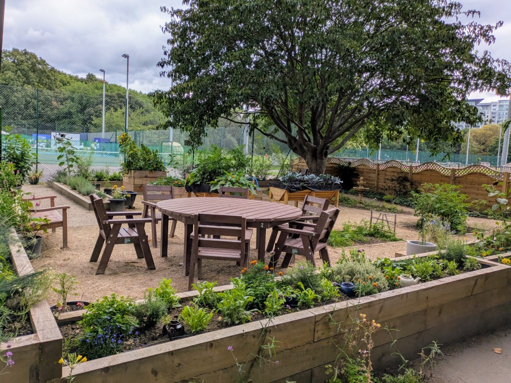 Enclosed therapeutic garden within the Thrive Garden, Battersea Park, July 2025
