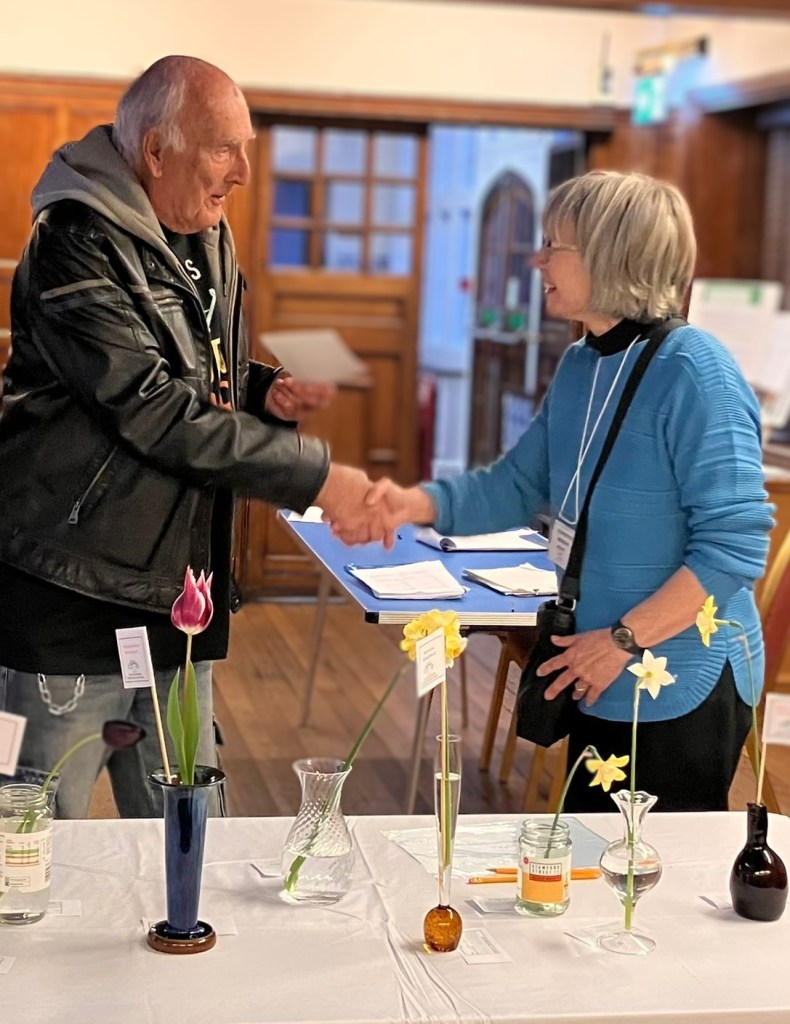 Kathy A receiving her 'Best in Class 2' certificate from John Hughes CABAHS Spring Show 2026