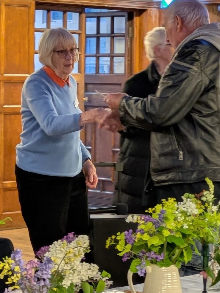 Carol receiving her 'Best in Class 5' certificate from John Hughes CABAHS Spring Show 2026