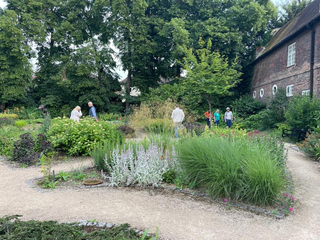 Members stroll around the Old Pond Garden before the CABAHS GQT, June 2026