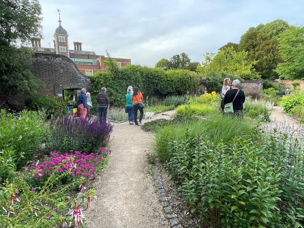 Members stroll around the Old Pond Garden before the CABAHS GQT, June 2026
