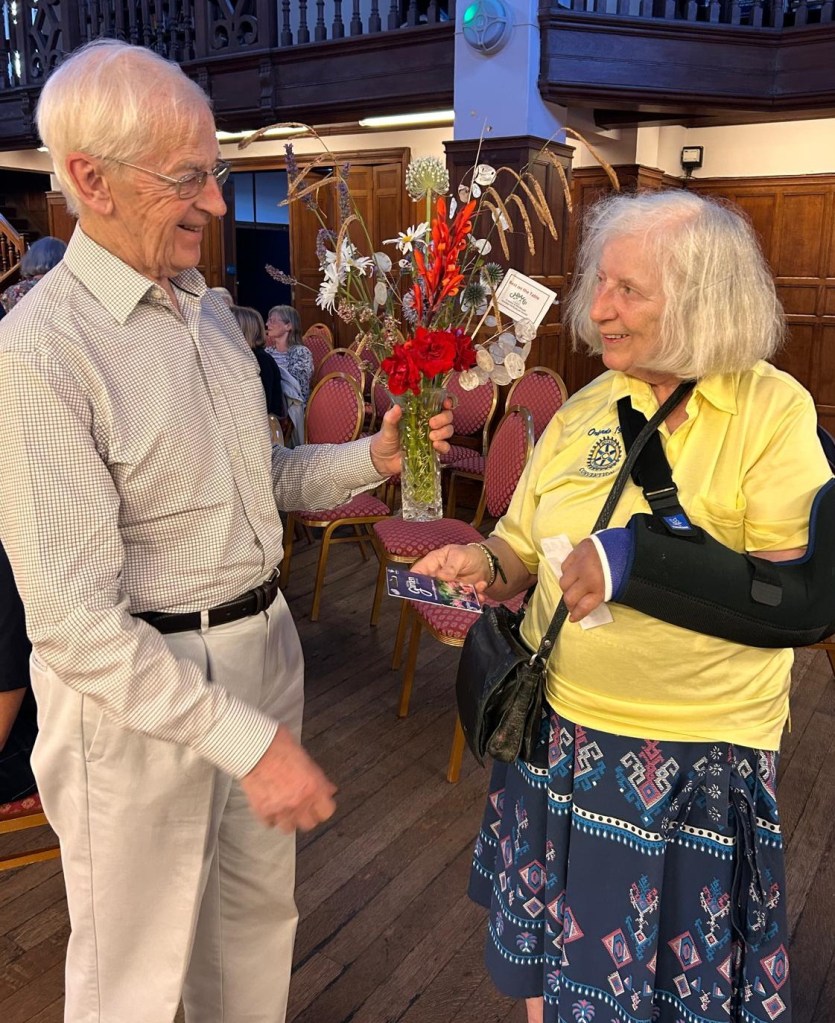 Sir Nicolas presenting Annie with her 'Best on the Show Table' voucher, July 2026
